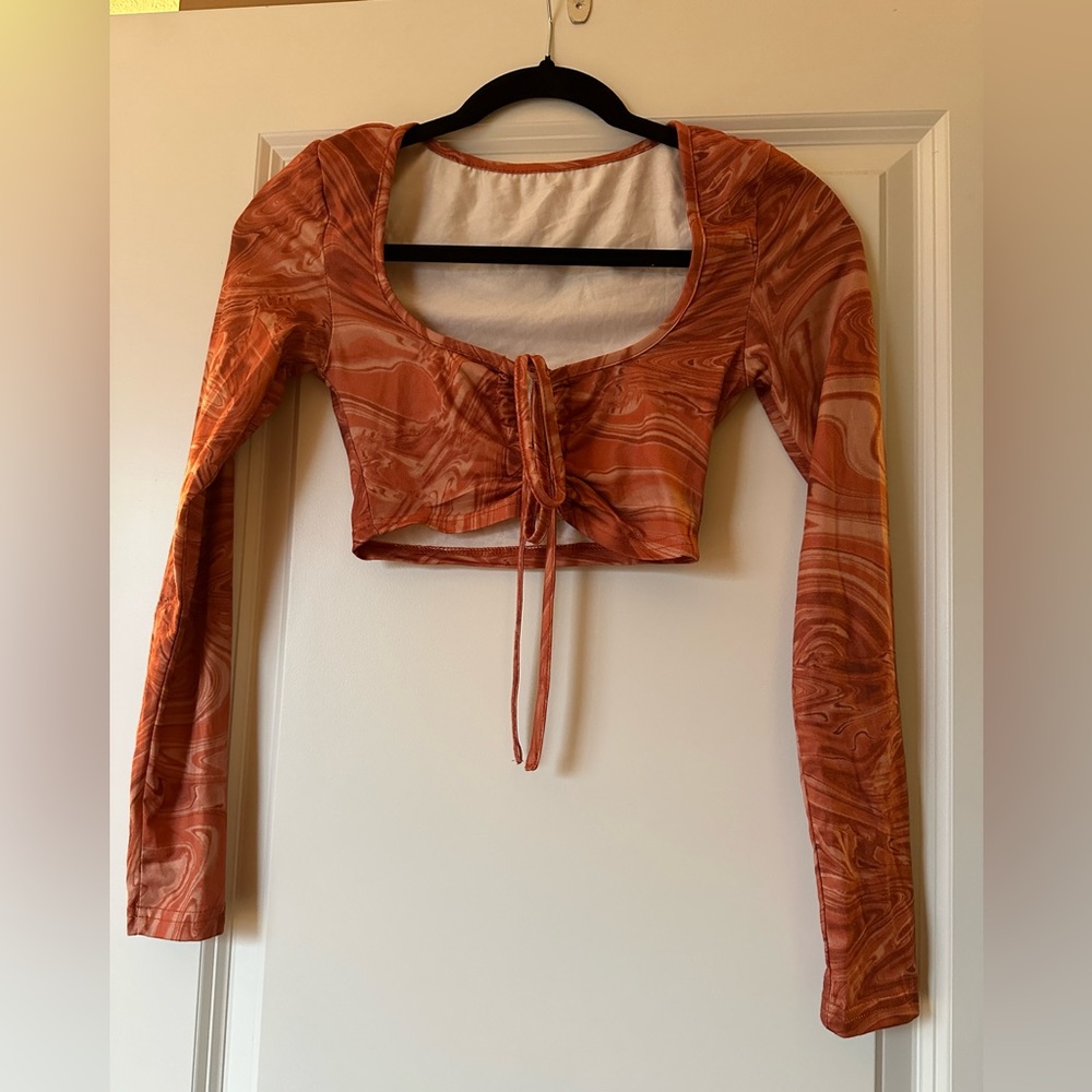 Cute little top for the club. From SHEIN, only worn a couple of times.